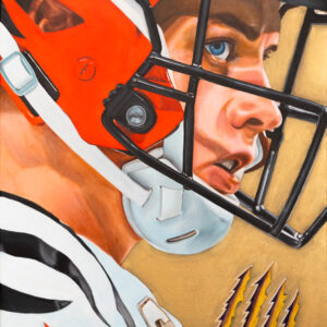Portrait of nfl quaterback Joe Burrow with gold background an tiger stripes