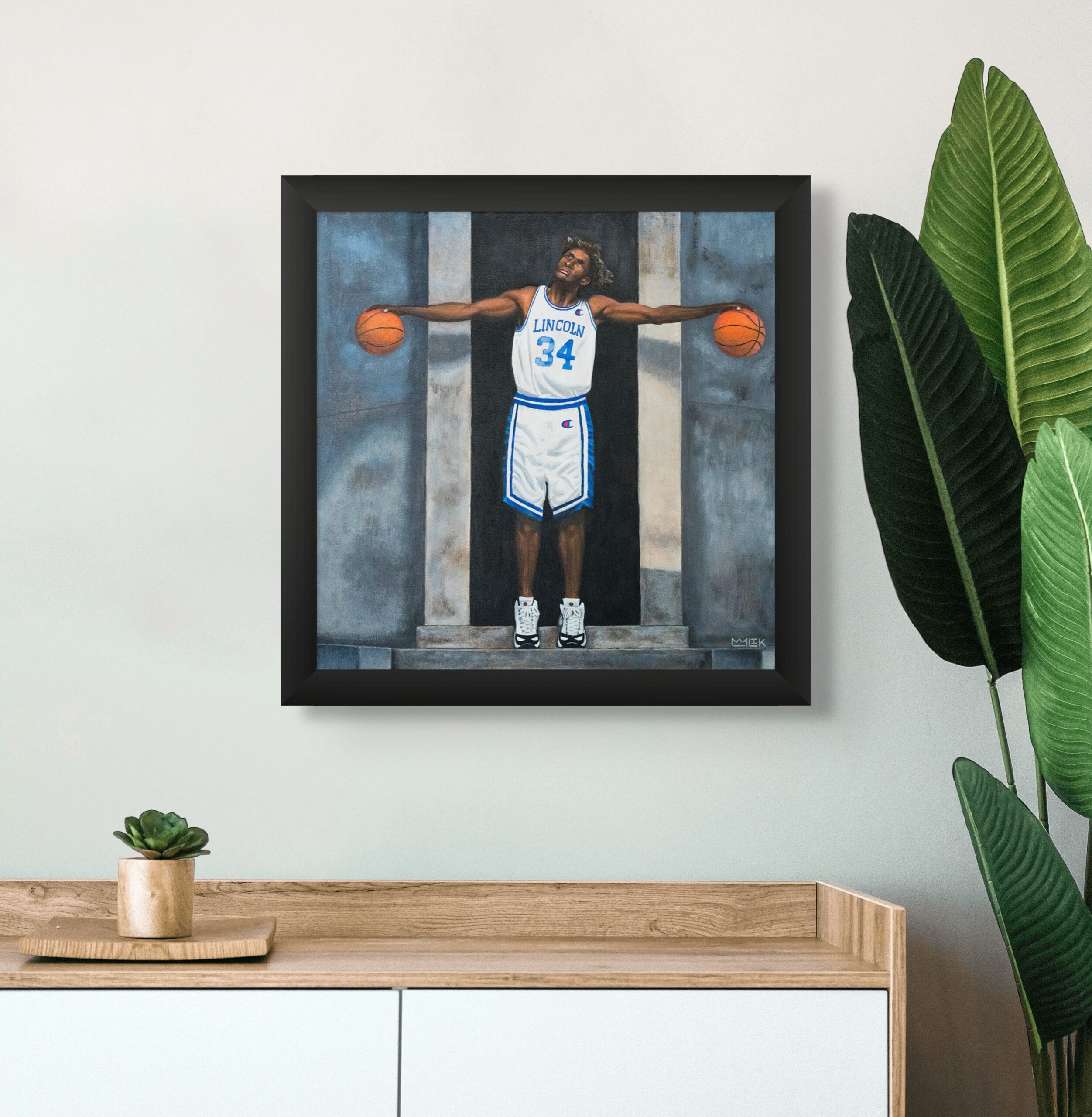 Framed Jesus Shuttlesworth portrait painting by Jamaal Malik displayed in modern interior setting (14x14 acrylic on canvas)